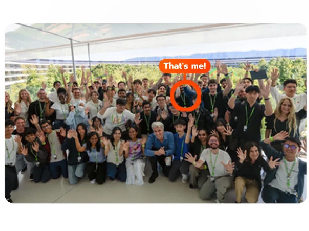 The Swift Student Challenge Distinguished Winners cohort, gathered outdoors at Apple Park